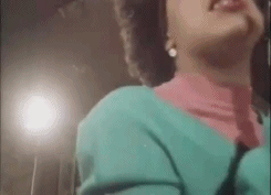 Poly Styrene from XRay Spex sings for her audience [gif]
