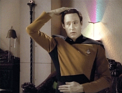 Data from Star Trek pats his head and rubs his stomach at the same time. [gif]