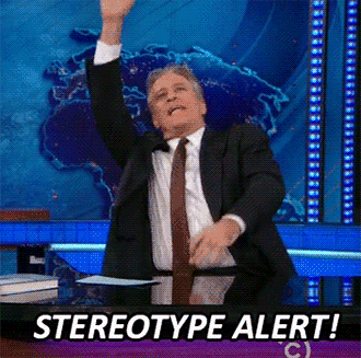 Jon Stewart flails his arms in the air, saying "Stereotype alert!" [gif]