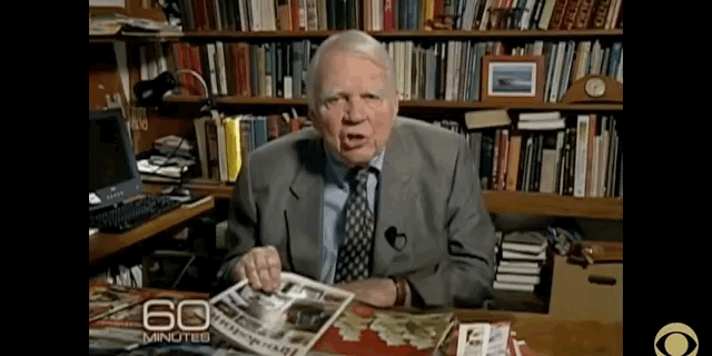 Andy Rooney flips through magazines on 60 minutes [gif]