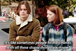 Jordan Catalano, played by Jared Leto, looks confused as Angela Chase lectures him. She says, "It's like sometimes people fill their minds with all these stupid things, you know?"