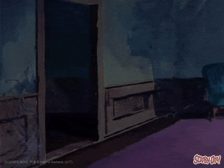 A headless man walks through a room with a candle from Scooby-Doo [gif]