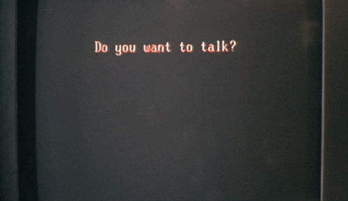 From the movie Pretty in Pink, a 1980s computer screen with a blinking cursor reads, "Do you want to talk?"