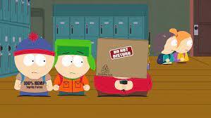 Kyle and Stan look on as Cartman wears a box over his head on South Park.