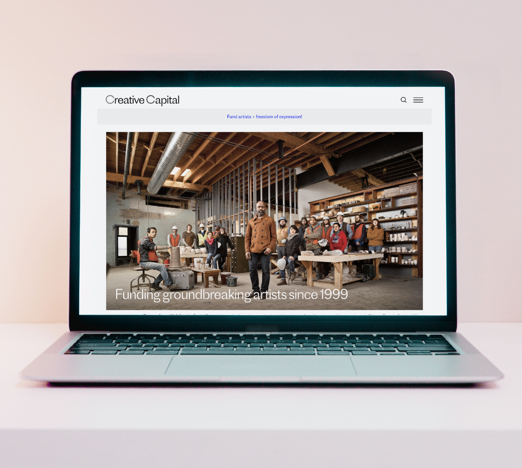 Laptop displaying the Creative Capital site